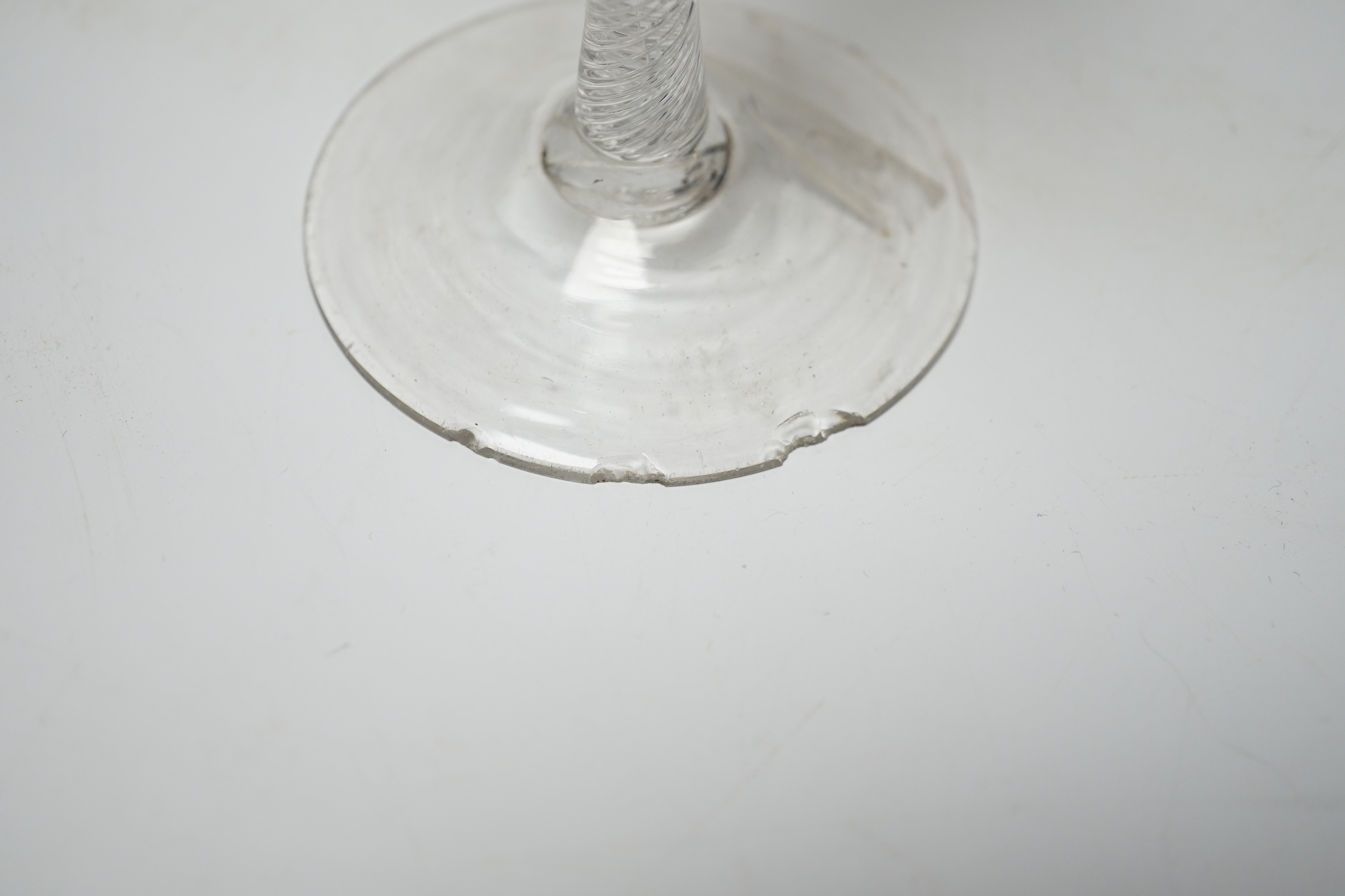 Three 18th century air twist stemmed wine glasses, tallest 16.5cm high